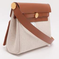 مملوكة مسبقًا حقيبة هيرمس هيرباغ 20 كانفاس وجلد بني/بيج معدن مطلي ذهب