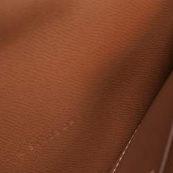 Pre Owned محفظة هيرمس كيلي بوكيت مادام ذهبي طويل