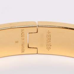 Pre Owned Hermes Clic H Orange Enamel Gold Plated Narrow Bracelet