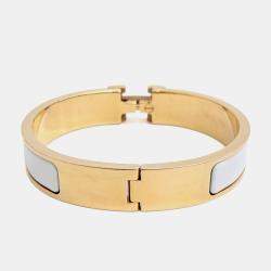 Pre Owned كليكاش بطلاء ذهبي هيرمس