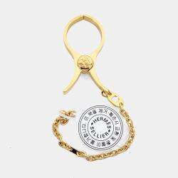 Pre Owned حلقة مفاتيح معدنية هيرمس وحلقة قفاز