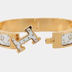 Pre Owned Hermes Clich Cheetah Size Pm Orfevre/Jaune D'Or/White Enamel Metal