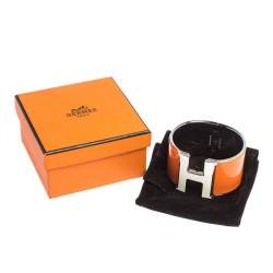 Pre Owned Hermes Clic Clac H Orange Enamel Palladium Plated Extra Wide Bracelet PM