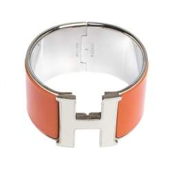 Pre Owned Hermes Clic Clac H Orange Enamel Palladium Plated Extra Wide Bracelet PM