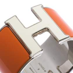 Pre Owned Hermes Clic Clac H Orange Enamel Palladium Plated Extra Wide Bracelet PM