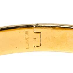 Pre Owned Hermes Clic H Red Enamel Gold Plated Narrow Bracelet PM