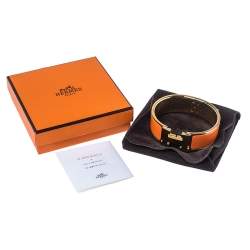 Pre Owned Hermes Clic Clac H Orange Enamel Gold Plated Wide Bracelet PM