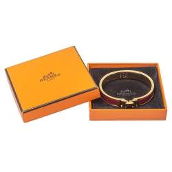Pre Owned Hermès Clic H Red Enamel Gold Plated Narrow Bracelet PM