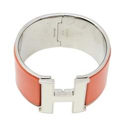 Pre Owned Hermes Clic Clac H Orange Enamel Palladium Plated Extra Wide Bracelet PM