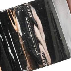 Pre Owned Hermes Clic Clac H Orange Enamel Palladium Plated Extra Wide Bracelet PM