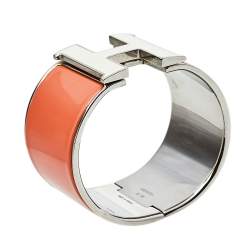 Pre Owned Hermes Clic Clac H Orange Enamel Palladium Plated Extra Wide Bracelet PM