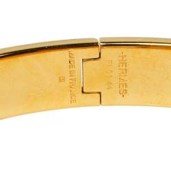 Pre Owned Hermès Clic H Red Enamel Gold Plated Narrow Bracelet PM 