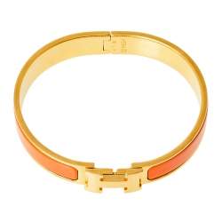Pre Owned Hermès Clic H Orange Enamel Gold Plated Narrow Bracelet PM