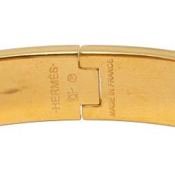 Pre Owned Hermès Clic H Orange Enamel Gold Plated Narrow Bracelet PM