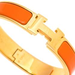 Pre Owned Hermès Clic H Orange Enamel Gold Plated Narrow Bracelet PM