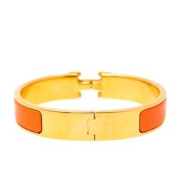 Pre Owned Hermès Clic H Orange Enamel Gold Plated Narrow Bracelet PM