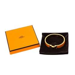 Pre Owned Hermès Clic H Orange Enamel Gold Plated Narrow Bracelet PM