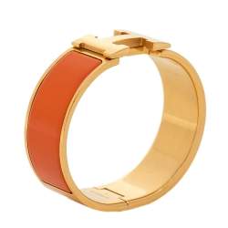 Pre Owned Hermès Clic Clac H Orange Enamel Gold Plated Wide Bracelet PM