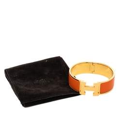 Pre Owned Hermès Clic Clac H Orange Enamel Gold Plated Wide Bracelet PM