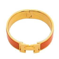 Pre Owned Hermès Clic Clac H Orange Enamel Gold Plated Wide Bracelet PM