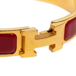 Pre Owned Hermès Clic H Red Enamel Gold Plated Narrow Bracelet PM