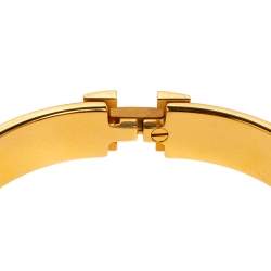 Pre Owned Hermès Clic H Red Enamel Gold Plated Narrow Bracelet PM