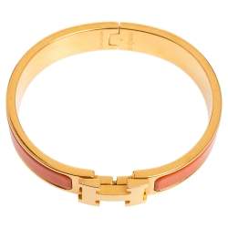 Pre Owned Hermès Clic H Orange Enamel Gold Plated Narrow Bracelet PM