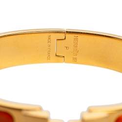 Pre Owned Hermès Clic H Orange Enamel Gold Plated Narrow Bracelet PM