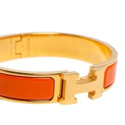 Pre Owned Hermès Clic H Orange Enamel Gold Plated Narrow Bracelet PM