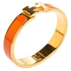 Pre Owned Hermès Clic H Orange Enamel Gold Plated Narrow Bracelet PM