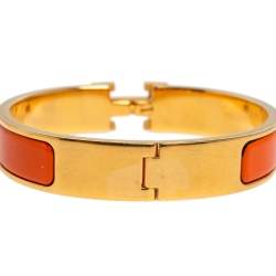 Pre Owned Hermès Clic H Orange Enamel Gold Plated Narrow Bracelet PM