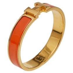 Pre Owned Hermès Clic H Orange Enamel Gold Plated Narrow Bracelet PM