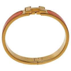 Pre Owned Hermès Clic H Orange Enamel Gold Plated Narrow Bracelet PM