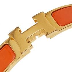 Pre Owned Hermès Clic H Orange Enamel Gold Plated Narrow Bracelet PM