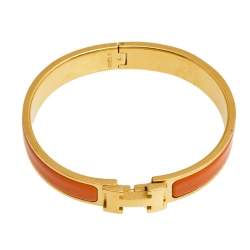 Pre Owned Hermès Clic H Orange Enamel Gold Plated Narrow Bracelet PM