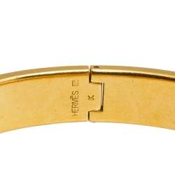 Pre Owned Hermès Clic H Orange Enamel Gold Plated Narrow Bracelet PM