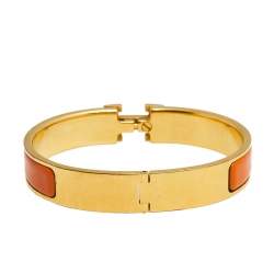 Pre Owned Hermès Clic H Orange Enamel Gold Plated Narrow Bracelet PM