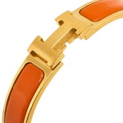 Pre Owned Hermès Clic H Orange Enamel Gold Plated Narrow Bracelet PM