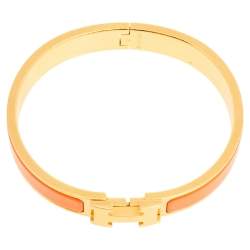 Pre Owned Hermès Clic H Orange Enamel Gold Plated Narrow Bracelet M
