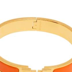 Pre Owned Hermès Clic H Orange Enamel Gold Plated Narrow Bracelet M