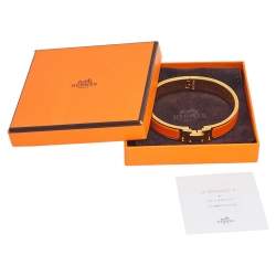Pre Owned Hermès Clic H Orange Enamel Gold Plated Narrow Bracelet M