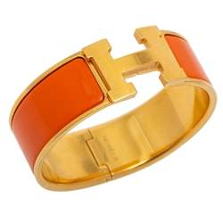 Pre Owned Hermès Clic Clac H Orange Enamel Gold Plated Wide Bracelet