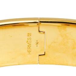 Pre Owned Hermes Clic Clac H Enamel Gold Plated Wide Bracelet PM