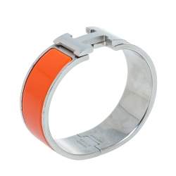 Pre Owned Hermes Clic Clac H Orange Enamel Palladium Plated Wide Bracelet PM
