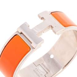 Pre Owned Hermes Clic Clac H Orange Enamel Palladium Plated Wide Bracelet PM