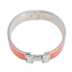 Pre Owned Hermes Clic Clac H Orange Enamel Palladium Plated Wide Bracelet PM