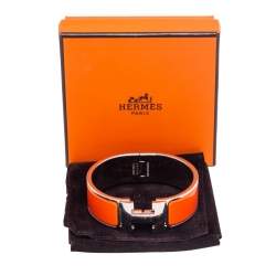 Pre Owned Hermes Clic Clac H Orange Enamel Palladium Plated Wide Bracelet PM