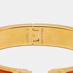 Pre Owned Hermes Clic H Gold Plate Orange Enamel Cuff Bracelet PM