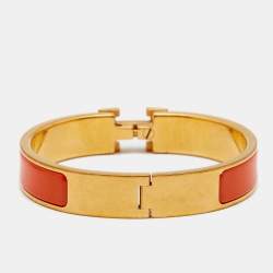 Pre Owned Hermes Clic H Gold Plate Orange Enamel Cuff Bracelet PM