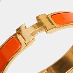 Pre Owned Hermes Clic H Gold Plate Orange Enamel Cuff Bracelet PM
